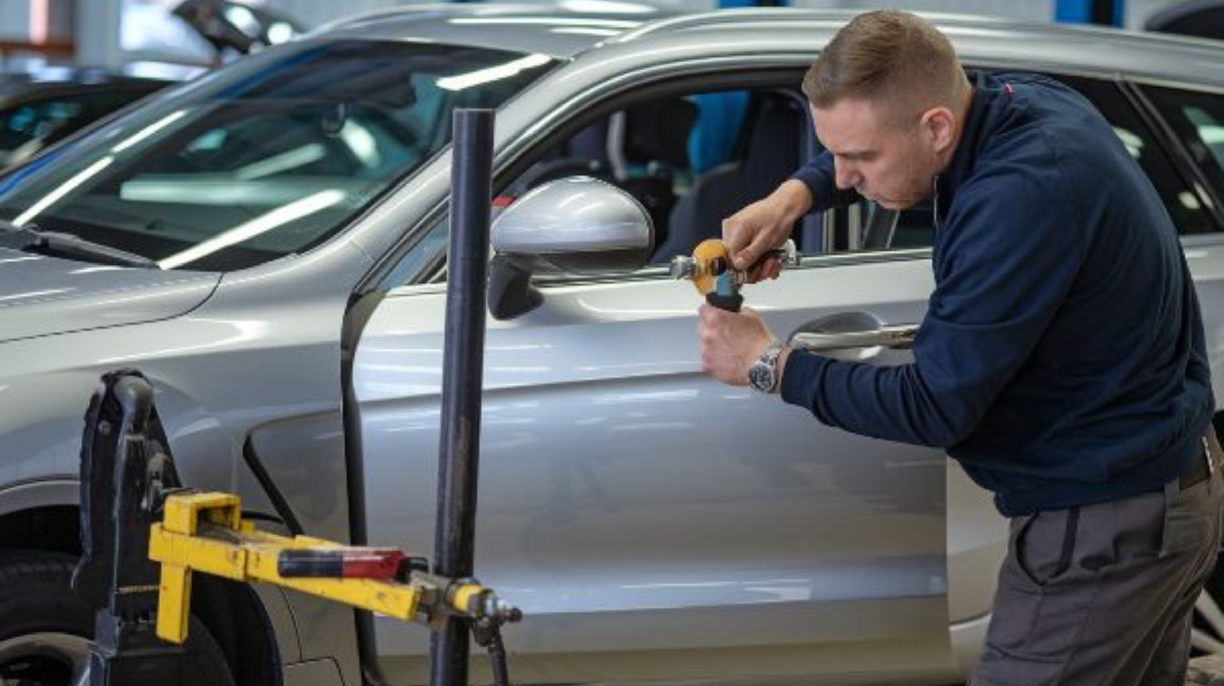Paintless Dent Repair technician Paintless Dent Repair technician