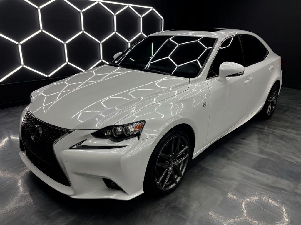 White-Lexus-in-paint-booth-lighting-after-bumper-repair-Hi-Tech-Auto-Collision-Long-Beach